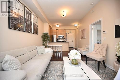 410 - 1360 Costigan Road, Milton, ON - Indoor Photo Showing Living Room