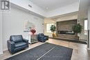 410 - 1360 Costigan Road, Milton, ON  - Indoor Photo Showing Living Room With Fireplace 