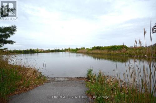 410 - 1360 Costigan Road, Milton, ON - Outdoor With Body Of Water With View