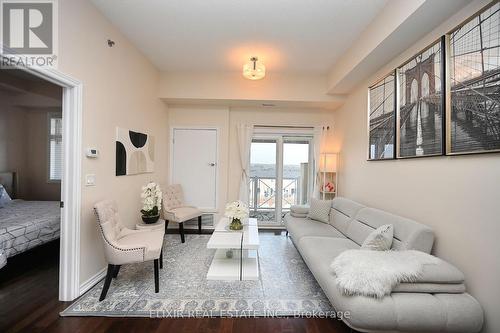 410 - 1360 Costigan Road, Milton, ON - Indoor Photo Showing Living Room