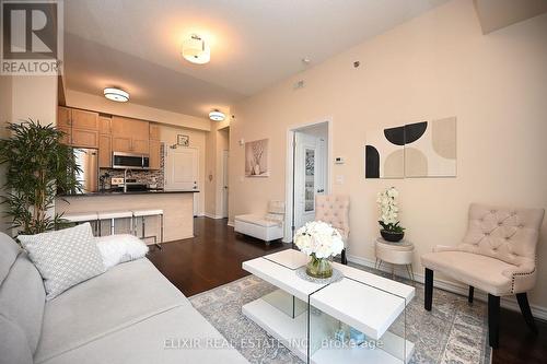 410 - 1360 Costigan Road, Milton, ON - Indoor Photo Showing Living Room