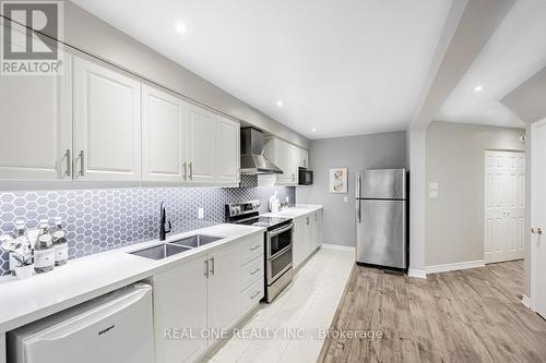 69 - 2288 The Collegeway, Mississauga, ON - Indoor Photo Showing Kitchen With Double Sink With Upgraded Kitchen