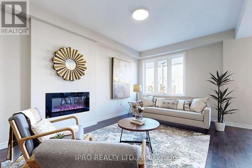 15 Dresser Lane, Hamilton, ON - Indoor Photo Showing Living Room With Fireplace