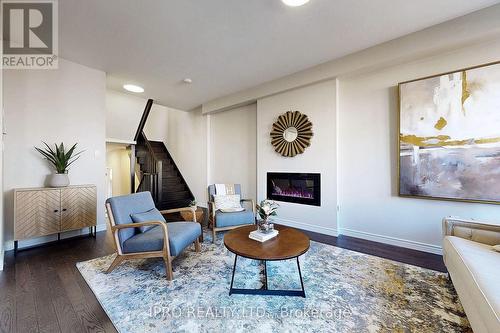 15 Dresser Lane, Hamilton, ON - Indoor Photo Showing Living Room With Fireplace