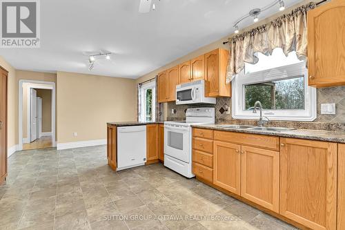 11 Minto Street, Whitewater Region, ON - Indoor Photo Showing Kitchen With Double Sink