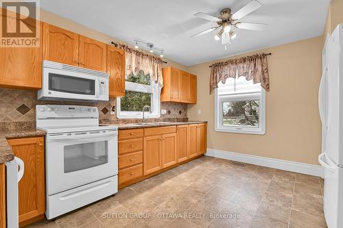 11 Minto Street, Whitewater Region, ON - Indoor Photo Showing Kitchen With Double Sink