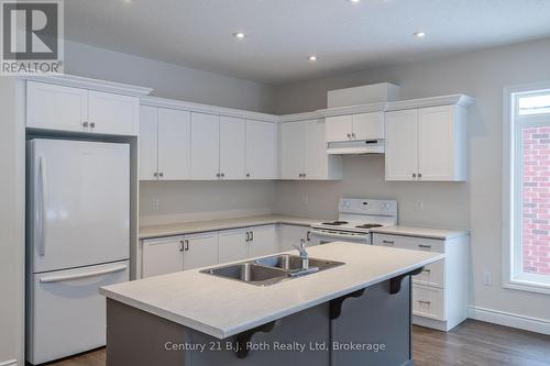 53 Ralph Dalton Boulevard, Tay (Victoria Harbour), ON - Indoor Photo Showing Kitchen With Double Sink