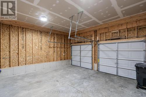 53 Ralph Dalton Boulevard, Tay (Victoria Harbour), ON - Indoor Photo Showing Garage