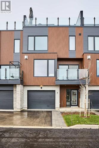 4 - 117 Sladden Court, Blue Mountains, ON - Outdoor With Facade