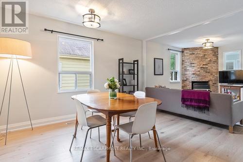 135 Deane Avenue, Oakville, ON - Indoor Photo Showing Dining Room With Fireplace