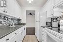 210 - 737 Deveron Crescent, London, ON  - Indoor Photo Showing Kitchen With Double Sink 