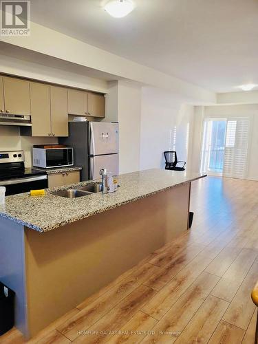 239 Royal Northern Path, Oshawa, ON - Indoor Photo Showing Kitchen With Double Sink