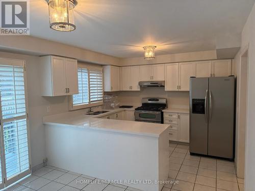 5889 River Grove Avenue, Mississauga, ON - Indoor Photo Showing Kitchen With Double Sink