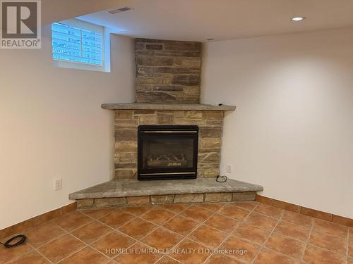 5889 River Grove (Bsmt) Avenue, Mississauga, ON - Indoor Photo Showing Living Room With Fireplace