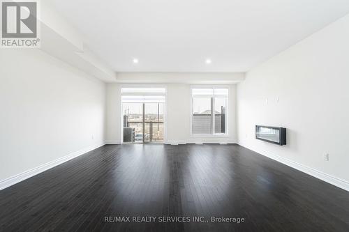 399 Tennant Circle, Vaughan, ON - Indoor Photo Showing Living Room With Fireplace