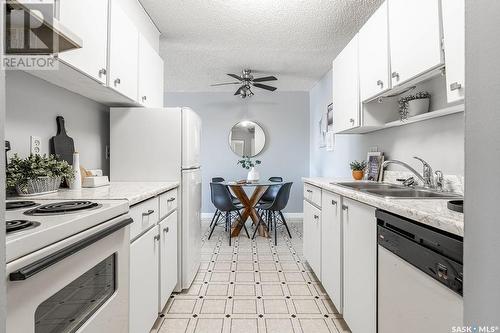 63 1 Columbia Drive, Saskatoon, SK - Indoor Photo Showing Kitchen With Double Sink