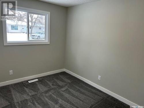 34 Bligh Bay, Regina, SK - Indoor Photo Showing Other Room