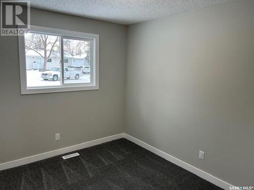 34 Bligh Bay, Regina, SK - Indoor Photo Showing Other Room