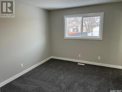 34 Bligh Bay, Regina, SK - Indoor Photo Showing Other Room