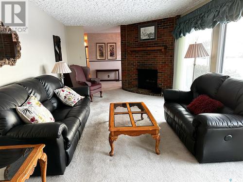 1501 92Nd Street, North Battleford, SK - Indoor Photo Showing Living Room With Fireplace