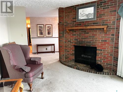 1501 92Nd Street, North Battleford, SK - Indoor Photo Showing Living Room With Fireplace