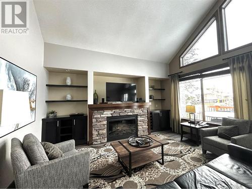 Living Area w Fireplace - 800 Bighorn Boulevard Unit# 831 -A/B, Radium Hot Springs, BC - Indoor Photo Showing Living Room With Fireplace