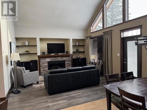 800 Bighorn Boulevard Unit# 831 -A/B, Radium Hot Springs, BC - Indoor Photo Showing Living Room With Fireplace