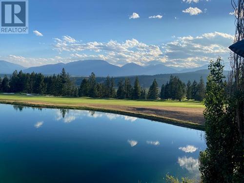 Western View over the Pond, The Springs Golf Course from the Corner Balcony of Unit 833. - 800 Bighorn Boulevard Unit# 831 -A/B, Radium Hot Springs, BC - Outdoor With Body Of Water With View