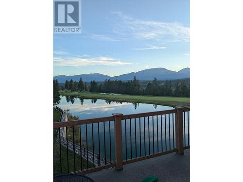 Corner Balcony Western View across the pond, #9  fairway of The Springs Golf - 800 Bighorn Boulevard Unit# 831 -A/B, Radium Hot Springs, BC - Outdoor With Balcony With View