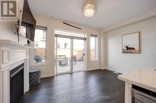 4 Kempsford Crescent, Brampton, ON - Indoor Photo Showing Living Room With Fireplace