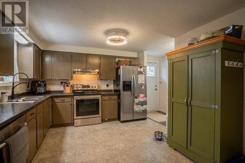 261 Elm Avenue, 100 Mile House, BC - Indoor Photo Showing Kitchen With Double Sink