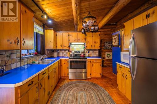 13820 Bergman Road, Prince George, BC - Indoor Photo Showing Kitchen With Double Sink