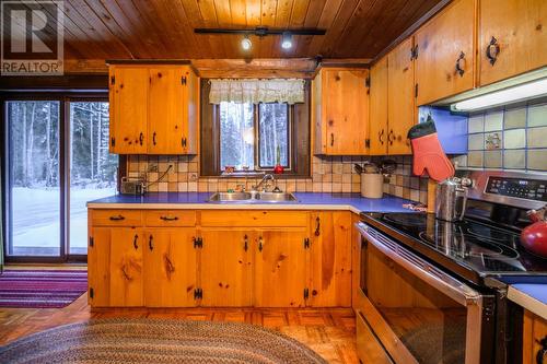 13820 Bergman Road, Prince George, BC - Indoor Photo Showing Kitchen With Double Sink