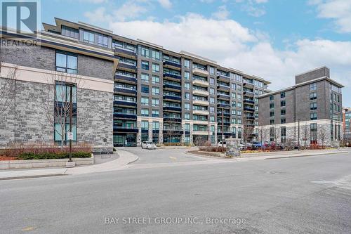 531 - 25 Water Walk Drive, Markham, ON - Outdoor With Facade