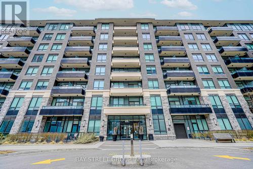 531 - 25 Water Walk Drive, Markham, ON - Outdoor With Facade