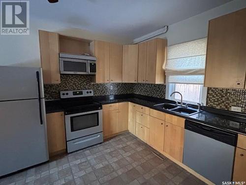 222 2Nd Avenue E, Canora, SK - Indoor Photo Showing Kitchen With Double Sink