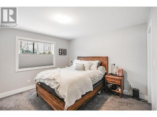 Primary Bedroom - #2-313 Lakeview Street, Castlegar, BC - Indoor Photo Showing Bedroom