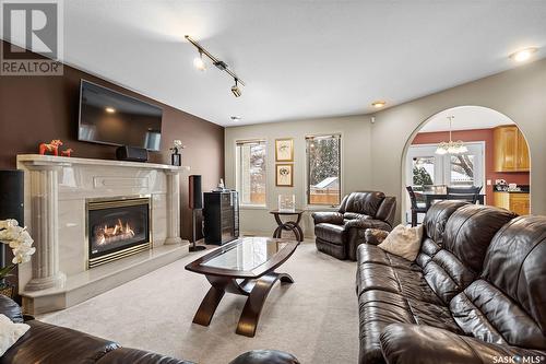 910 Braeside Place, Saskatoon, SK - Indoor Photo Showing Living Room With Fireplace