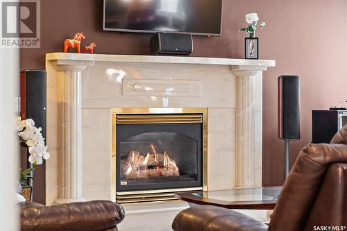 910 Braeside Place, Saskatoon, SK - Indoor Photo Showing Living Room With Fireplace