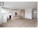 Stunning open concept living with high-end finishing and natural light throughout - 888 Patterson Avenue, Kelowna, BC  - Indoor Photo Showing Kitchen With Upgraded Kitchen 