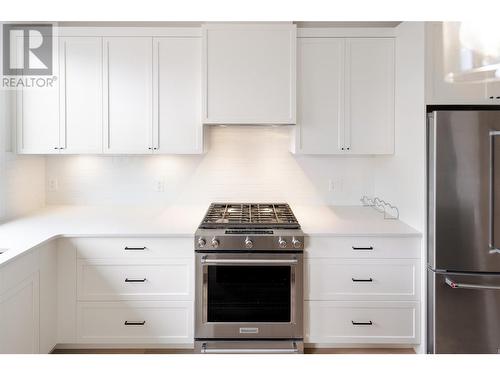 Gas Range - 888 Patterson Avenue, Kelowna, BC - Indoor Photo Showing Kitchen With Upgraded Kitchen