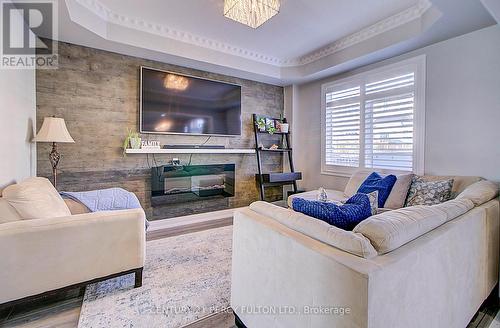 22 Down Crescent, Ajax, ON - Indoor Photo Showing Living Room With Fireplace