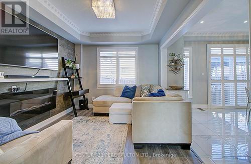 22 Down Crescent, Ajax, ON - Indoor Photo Showing Living Room With Fireplace