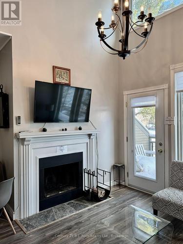 5231 Signature Grandview Drive, Huntsville (Chaffey), ON - Indoor Photo Showing Living Room With Fireplace