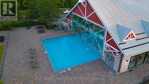 2227 - 90 Highland Drive, Oro-Medonte, ON - Outdoor With In Ground Pool