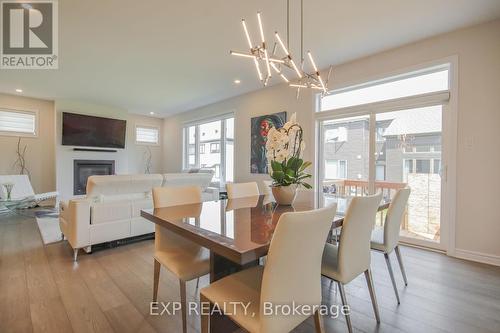 4559 Kelly Farm Drive, Ottawa, ON - Indoor Photo Showing Dining Room With Fireplace