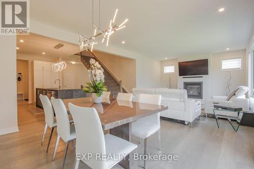 4559 Kelly Farm Drive, Ottawa, ON - Indoor Photo Showing Dining Room With Fireplace