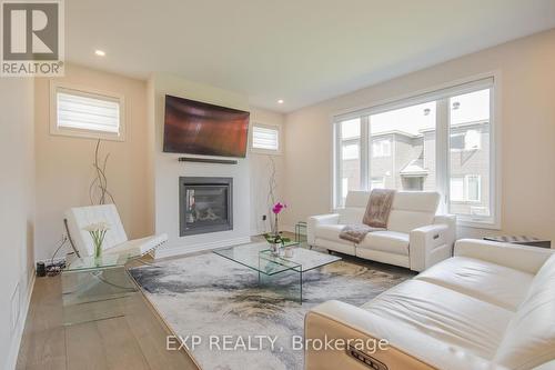 4559 Kelly Farm Drive, Ottawa, ON - Indoor Photo Showing Living Room With Fireplace