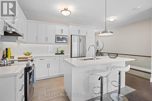 2 - 135 Borden Trail N, Welland, ON - Indoor Photo Showing Kitchen With Double Sink With Upgraded Kitchen