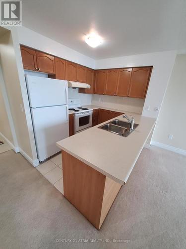 1810 - 50 Brian Harrison Way, Toronto, ON - Indoor Photo Showing Kitchen With Double Sink